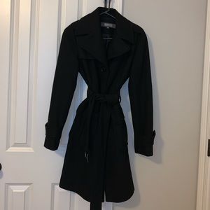 Long black single breasted lined pea coat w/belt.